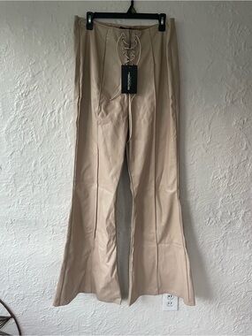 NWT PrettyLittleThing Faux Leather Lace Up Flared Pants Tan Beige; size L